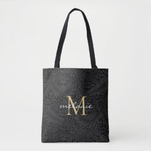 Elegantes schwarzes florales goldenes Schriftmonog