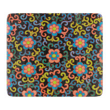 Elegantes schwarzes Muster mit farbenfrohen Blumen