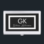 Elegantes Schwarzweiss-Monogramm Visitenkarten Dose<br><div class="desc">Dieser elegante Schwarzweiss-Geschäftskartenkasten hat mit Monogramm Initialen in einer modernen weißen Typografie mit Ihrem Namen unten,  der durch einen weißen Rahmen betont wird.  Entworfen durch Künstler Susan Coffey.</div>
