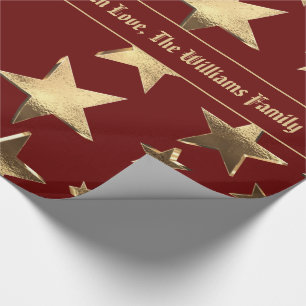 Elegantes Weihnachtsmuster aus Rot- und Goldstar Geschenkpapier