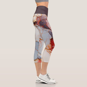 Elfenbeinmarmor mit karmesinroten und goldenen Ade Capri Leggings
