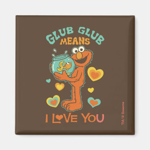 Elmo hält seinen Goldfisch Magnet