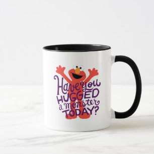 Elmo umarmt tasse