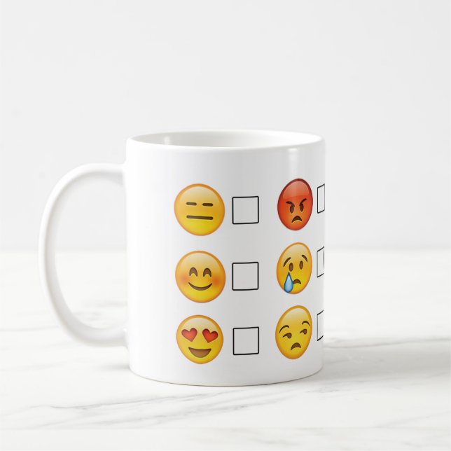 Emoji stellt Gefühle gegenüber Kaffeetasse (Links)