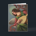 Engel mit Lute Feiertagskarte<br><div class="desc">Diese wunderschöne Abbildung aus der Jahrhundertwende zeigt einen himmlischen Engel, der die Laute spielt. Die Viktorianische gedruckte Interpretation stammt aus einem Originalgemälde im Vatikan. Das Original-Chromolithograph zeigt klare und gesättigte Farben und ein lebendiges Punktmuster. Engel mit Violine ist das Begleitbild und als separates Angebot erhältlich. Beide sind perfekt für die...</div>