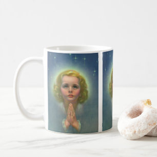 Engelhaftes blondes Mädchen mit Heiligenschein und Kaffeetasse