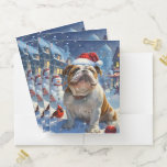 English Bulldog Winter Wonderland Christmas Joy Bewerbungsmappe<br><div class="desc">Dieses festliche Design spiegelt den fröhlichen Geist der Urlaubssaison wider und besticht durch ein hübsches Jungtier mit einer Weihnachtsmannmütze. Der Hund ist eingebettet in ein winterliches Wunderland, mit einem Schneemann, einem dekorierten Weihnachtsbaum und wunderschön verpackten Geschenken. Schneeflocken fallen sanft ab und geben der Szene eine magische Touch, während die lebhaften...</div>