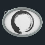 Enso Zen Circle Ovale Gürtelschnalle<br><div class="desc">Zen Spirit & Enso,  Zen Circles. Enso ist ein japanisches Wort,  das "Kreis" bedeutet,  und ein Begriff,  das eng mit Zen verbunden ist. Es symbolisiert das Absolute,  die Erleuchtung,  die Kraft,  die Eleganz,  das Universum und das Leere; es kann auch die japanische Ästhetik selbst symbolisieren.</div>