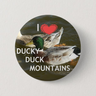 Entchen-Enten-Berge. Button