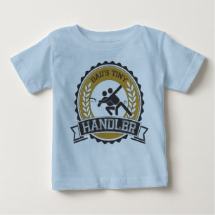 Entscheidender Frisbee - der kleine Lenker des Baby T-shirt