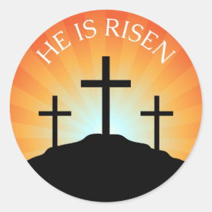 Er ist gestiegenes Kreuz gegen Sonnenaufgang Runder Aufkleber