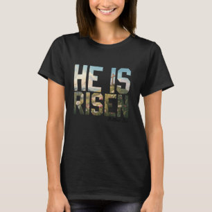 Er ist riskiert Wildblume kreuzen Jesus Christlich T-Shirt