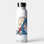 Erdnüsse | Linus und sein Deckblatt Trinkflasche<br><div class="desc">Linus ist Charlie Browns bester Freund und Bruder von Lucy und Rerun van Pelt. Karo aus diesem niedlichen Peanuts-Design mit Linus und seiner Decke.</div>