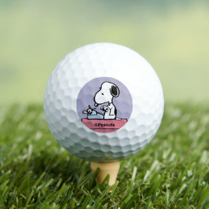 Erdnüsse   Snoopy bei der Schreibmaschine Golfball