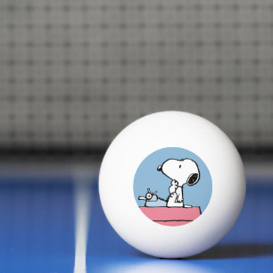 Erdnüsse Snoopy bei der Schreibmaschine Tischtennisball
