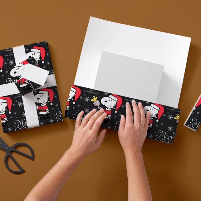 Erdnüsse | Snoopy & Woodstock Weihnachtsmann Geschenkpapier (Von Creator hochgeladen)