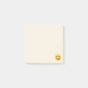 Erfülltes Emoji stellen gegenüber Post-it Klebezettel