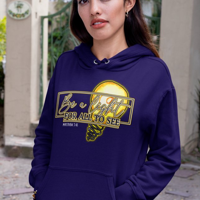 Erleuchten Sie die Welt mit unserem "Sei ein Licht Hoodie (Von Creator hochgeladen)