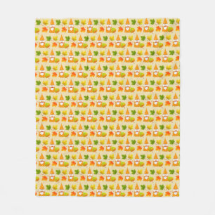 Erntedank-Zwerg und Herbstlaub auf Beige Fleecedecke