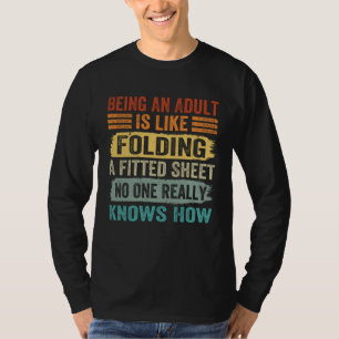 Erwachsen zu sein ist wie ein Spannbettlaken zu fa T-Shirt