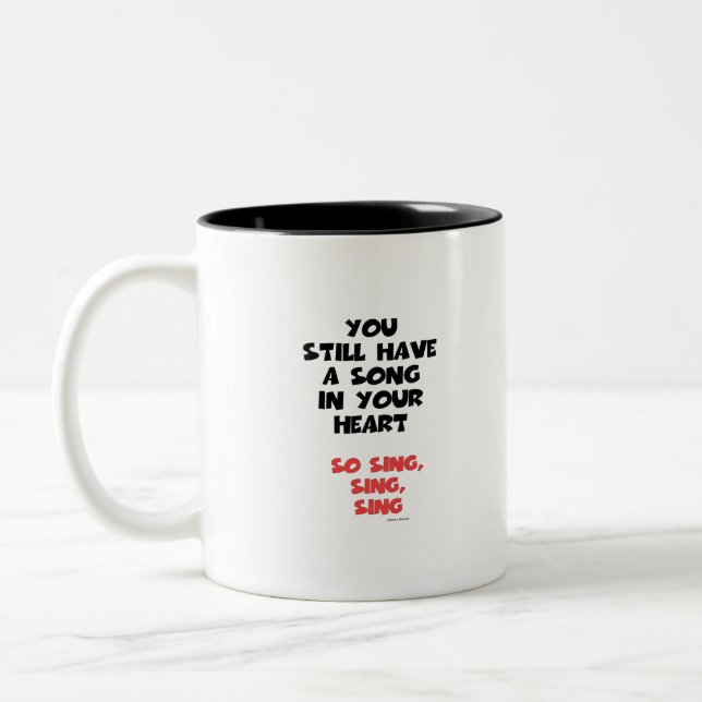 ES GIBT EIN SONG IN DEINEM HERZEN ZWEIFARBIGE TASSE (Links)