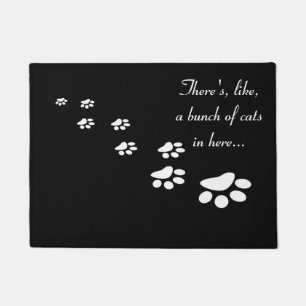 Es gibt, wie, ein Bündel Katzen in hier… Fußmatte