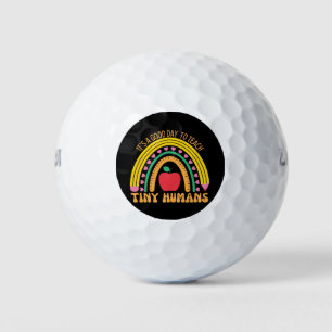 Es ist ein guter Tag, winzige Menschen zu unterric Golfball