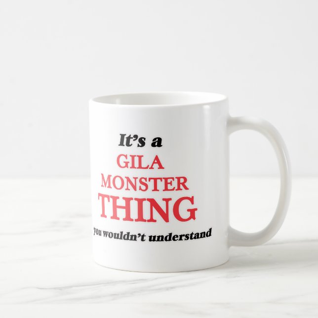 Es ist eine Gila-Krustenechsesache, Sie würde Tasse (Rechts)