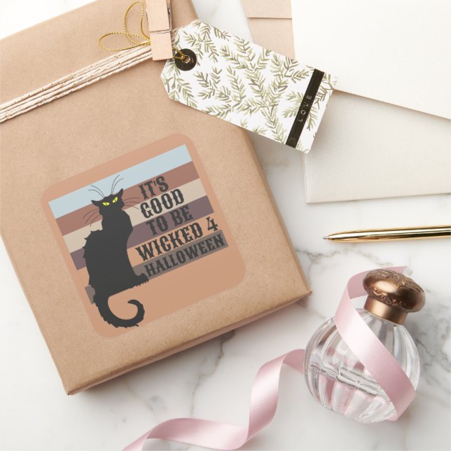 ES IST GUT, ZWISCHEN KATZE lustig GEWICKT ZU WERDE Quadratischer Aufkleber (Schenken)