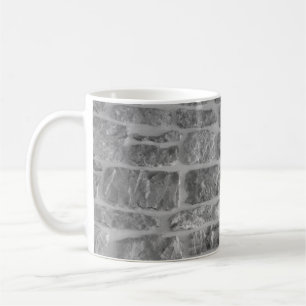 Es ist horizontales Steinrauhwandmuster Hintergrun Kaffeetasse