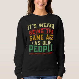 Es ist merkwürdig, das gleiche Alter wie alte Mens Sweatshirt