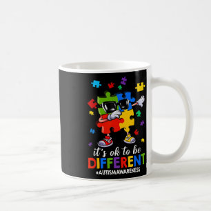 Es ist ok, ein anderes Dabbing Puzzle Autismus im Kaffeetasse