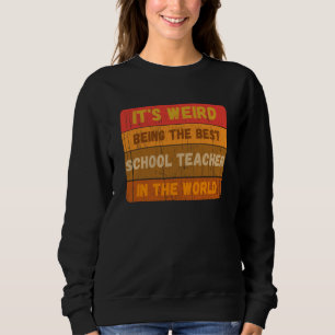 Es ist seltsam, der beste SCHULLEHRER in der Welt Sweatshirt