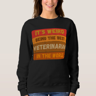 Es ist seltsam, der beste VETERINARIER der Welt zu Sweatshirt