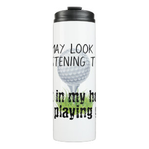 Es könnte so aussehen, als höre ich dir beim Golfs Thermosbecher