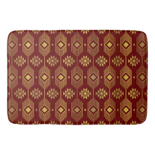 Ethnische rote und goldene Ikat-Geometrie Badematte