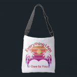 Everything I Am I Owe to You Retro Mom Bag Tragetaschen Mit Langen Trägern<br><div class="desc">Carry a heartfelt message with this retro-inspired design featuring the touching phrase “Everything I Am I Owe to You.” Warm sunset tones, vintage palm silhouettes, and bold retro styling create a vibrant artistic look inspired by nostalgic 70s aesthetics. This expressive design celebrates the love and gratitude we feel for Mom,...</div>
