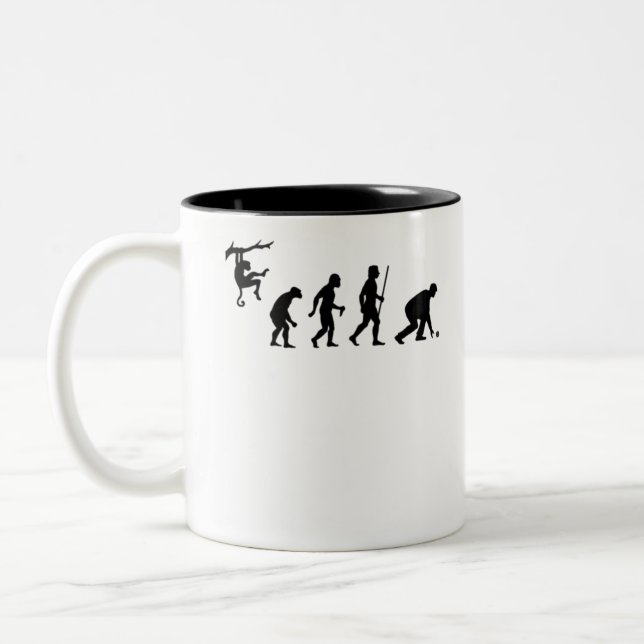 Evolution of Lawn Bowls Zweifarbige Tasse (Links)