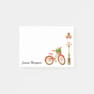 Fahrrad mit Körbchen von Blume nach der Eingabe Post-it Klebezettel