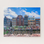 Fahrradhäuser am Amsterdamer Kanal Niederlande Puzzle<br><div class="desc">Dieses atemberaubende Puzzle mit Stadtmotiv bietet Fahrräder entlang des Amsterdamer Kanals mit Gebäude im Hintergrund. #amsterdam #netherlands #holland #canal #cyclcles #waterfront #canal #europe #travel #adventure #jigsaw #jigsaw #jigsawpuzzle #gifts #fun #stockingstopffers #games #games #games</div>