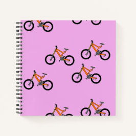 Fahrradmuster auf Rosa Notizbuch