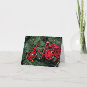 Fahrradschmuck auf einem Weihnachtsbaum Feiertagskarte
