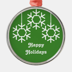 Fallende Schneeflocken rund um das Ornament, hellg Silbernes Ornament