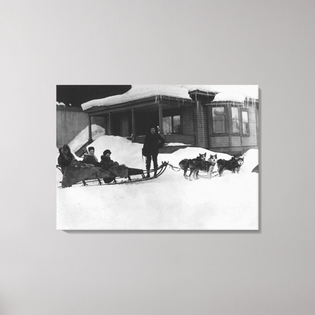 Familie mit Schlitten in Alaska Leinwanddruck (Vorderseite)