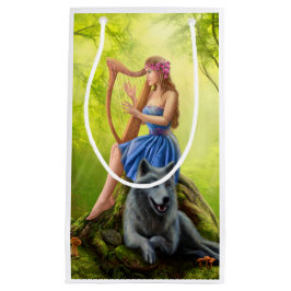 Fantasiemädchenfee- und -freundwolf. Spielt eine Kleine Geschenktüte