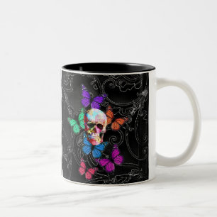 Fantasieschädel und farbige Schmetterlinge Zweifarbige Tasse