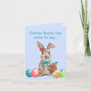 Fantasievoller Osterhase mit farbigen Eiern Karte