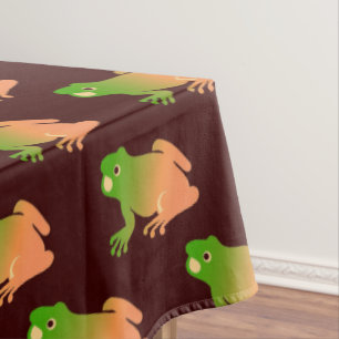 Farbblockfrosch auf braun tischdecke
