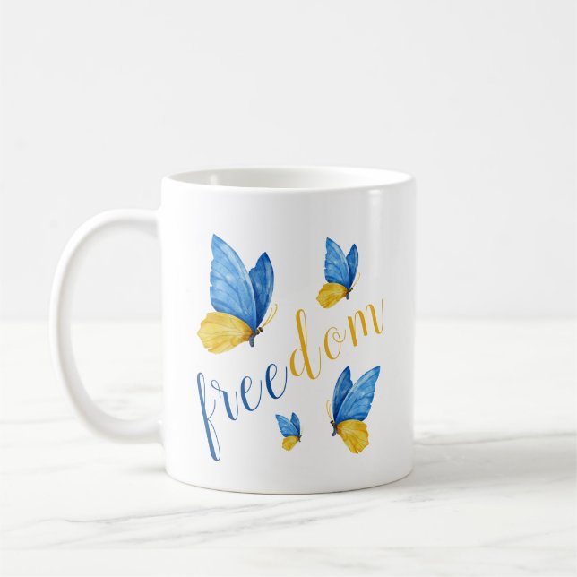 Farbenfrohe blaue Gelbe Schmetterling Kaffeetasse (Links)