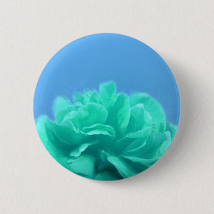 Farbenfrohe blaugrüne Blüte Button